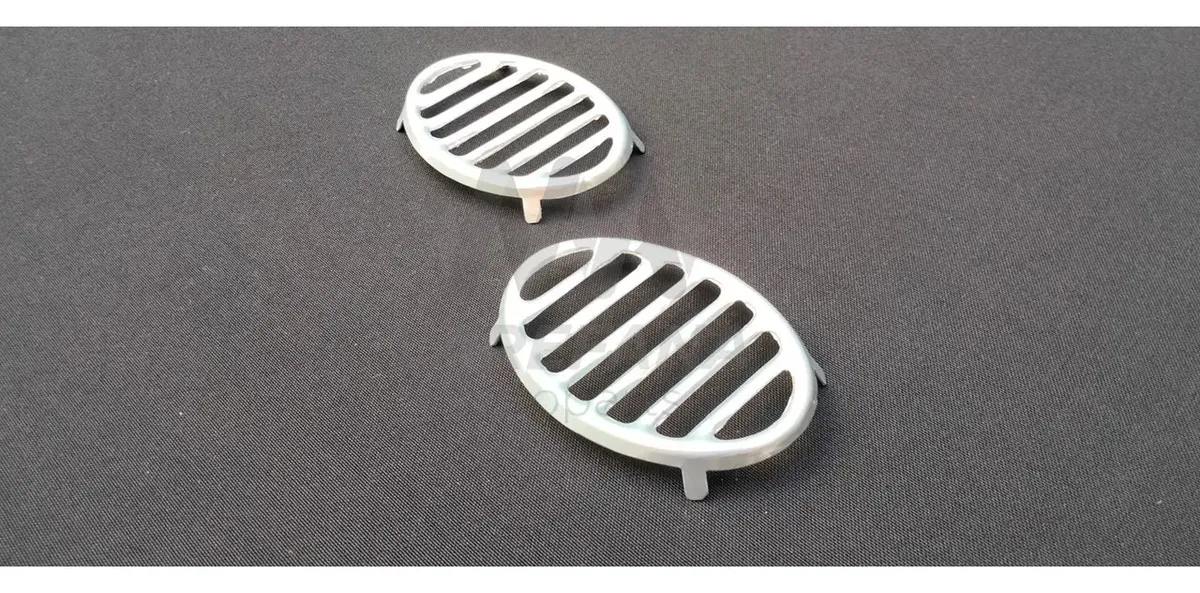 PAR DE REJILLAS DE SALPICADERA PARA VW SEDAN VOCHO MOTOR 1200